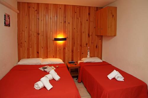 Imagen de la habitación del Hotel H&ocirc;tel Le Rialto. Foto 4