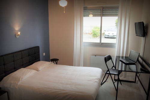 Imagen de la habitación del Hotel H&ocirc;tel Le Rohu. Foto 8