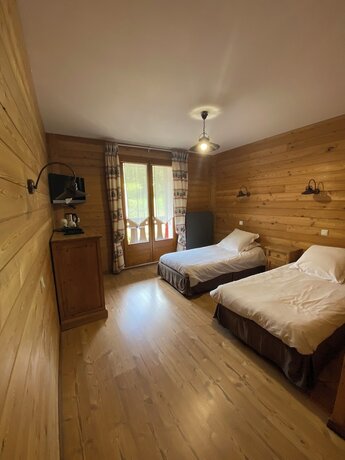 Imagen de la habitación del Hotel H&ocirc;tel Le Schuss. Foto 13