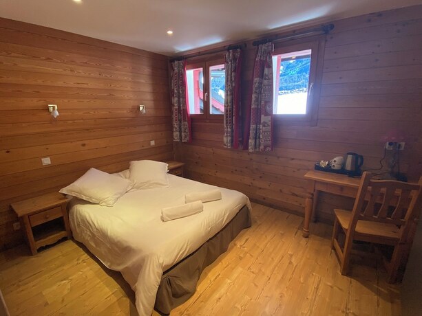 Imagen de la habitación del Hotel H&ocirc;tel Le Schuss. Foto 15