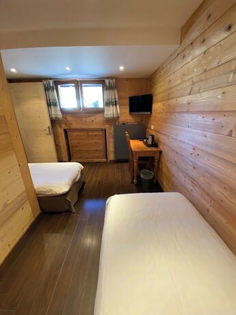 Imagen de la habitación del Hotel H&ocirc;tel Le Schuss. Foto 17