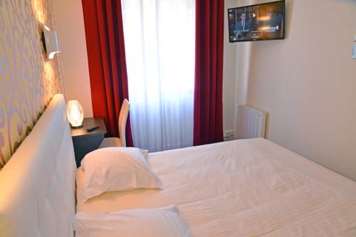 Imagen de la habitación del Hotel H&ocirc;tel Le Square, AURILLAC. Foto 3