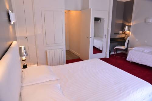 Imagen de la habitación del Hotel H&ocirc;tel Le Square. Foto 14