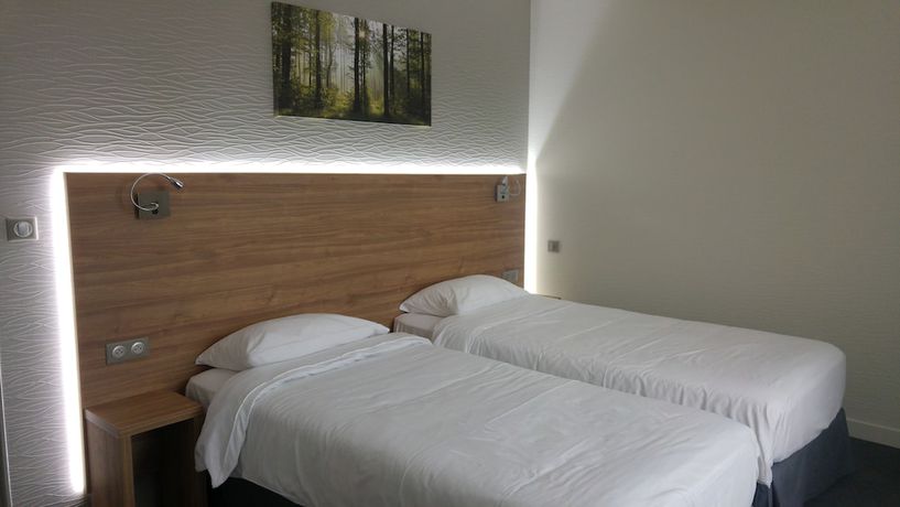 Imagen de la habitación del Hotel H&ocirc;tel Le Verger. Foto 7