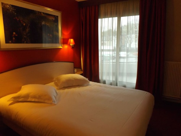 Imagen de la habitación del Hotel Hôtel Le Vert Galant. Foto 11