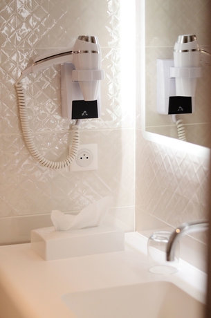 Imagen de la habitación del Hotel H&ocirc;tel Le XIX. Foto 10