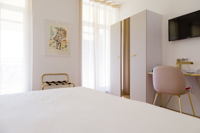 Imagen de la habitación del Hotel Hôtel Le Xix. Foto 13