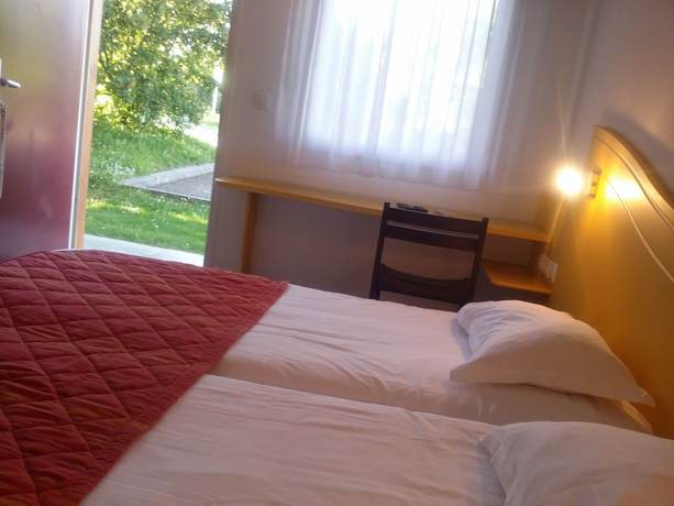 Imagen de la habitación del Hotel H&ocirc;tel L&eacute;mand Lyon Est - Villefontaine. Foto 12
