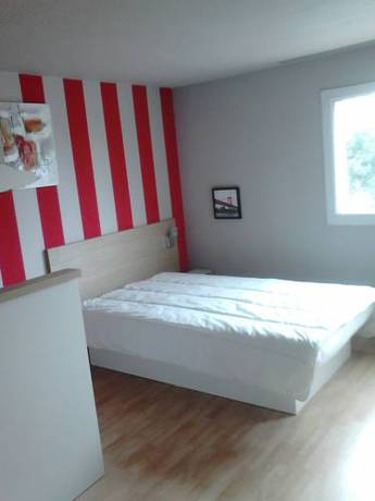 Imagen de la habitación del Hotel Hôtel L'eolienne. Foto 10