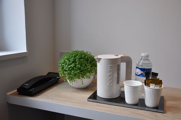 Imagen de la habitación del Hotel Hôtel Les 2 Villas. Foto 9