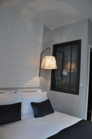 Imagen de la habitación del Hotel Hôtel Les 2 Villas. Foto 10