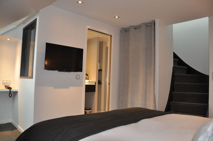 Imagen de la habitación del Hotel Hôtel Les 2 Villas. Foto 11