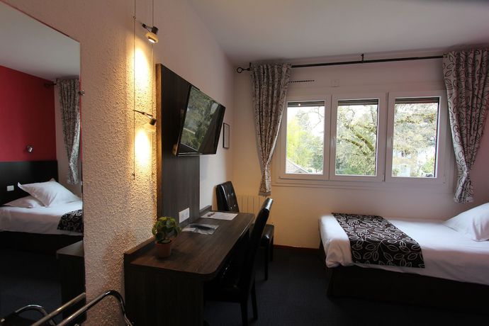 Imagen de la habitación del Hotel Hôtel Les Afforêts. Foto 6