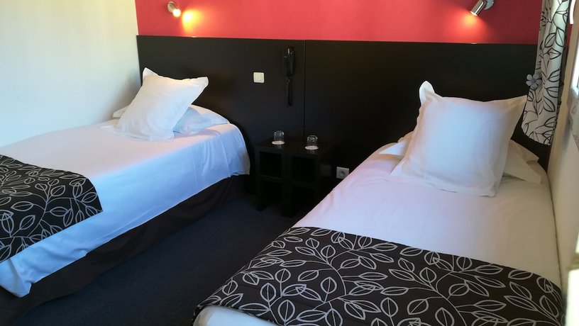 Imagen de la habitación del Hotel Hôtel Les Afforêts. Foto 15