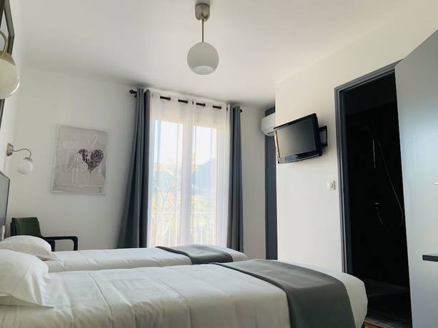 Imagen de la habitación del Hotel Hôtel Les Arbousiers. Foto 4