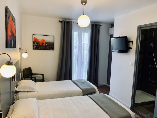 Imagen de la habitación del Hotel Hôtel Les Arbousiers. Foto 9