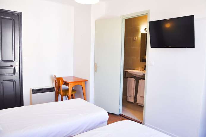 Imagen de la habitación del Hotel Hôtel Les Arbousiers. Foto 10