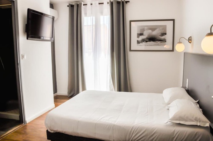 Imagen de la habitación del Hotel Hôtel Les Arbousiers. Foto 11