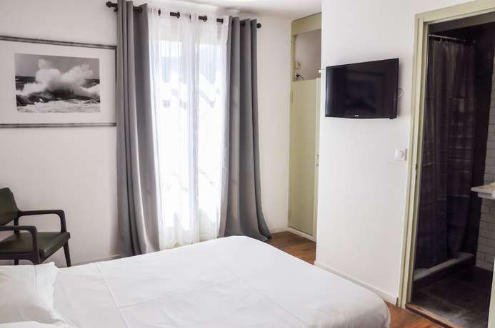 Imagen de la habitación del Hotel Hôtel Les Arbousiers. Foto 12