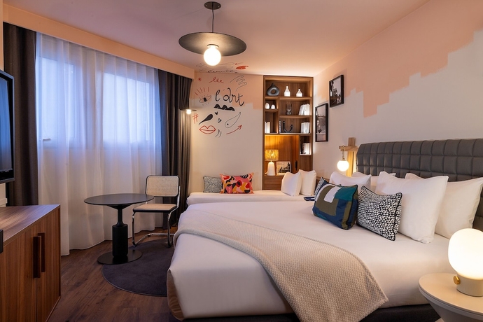 Imagen de la habitación del Hotel H&ocirc;tel Les Artistes. Foto 6