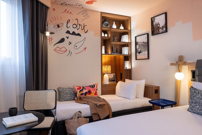 Imagen de la habitación del Hotel H&ocirc;tel Les Artistes. Foto 7