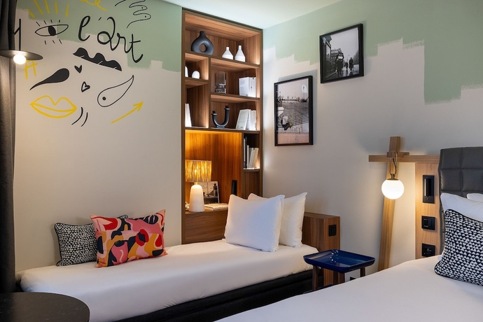 Imagen de la habitación del Hotel H&ocirc;tel Les Artistes. Foto 11