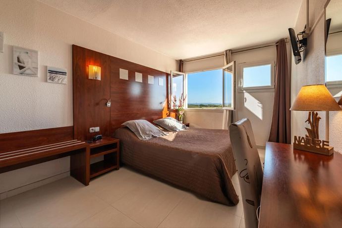 Imagen de la habitación del Hotel H&ocirc;tel Les Dunes. Foto 5