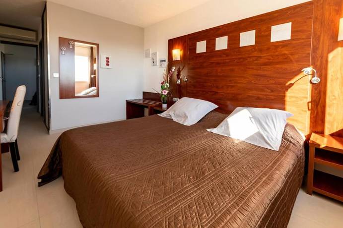 Imagen de la habitación del Hotel H&ocirc;tel Les Dunes. Foto 8