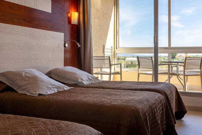 Imagen de la habitación del Hotel H&ocirc;tel Les Dunes. Foto 11