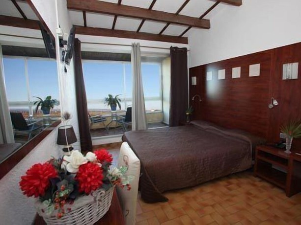 Imagen de la habitación del Hotel H&ocirc;tel Les Dunes. Foto 14