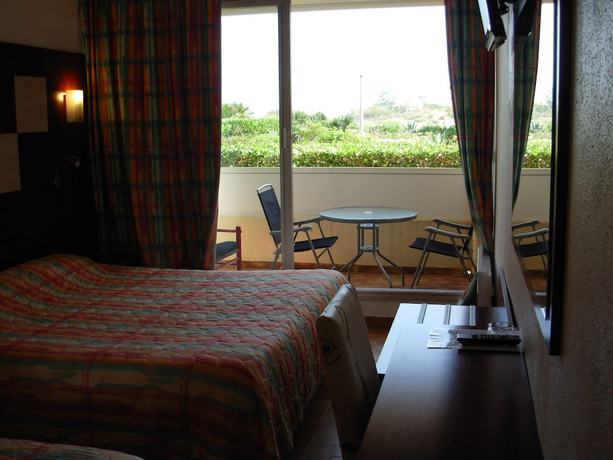 Imagen de la habitación del Hotel H&ocirc;tel Les Dunes. Foto 15