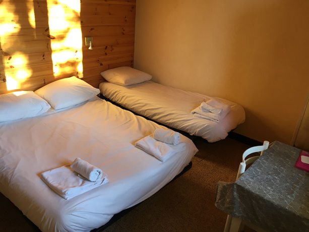 Imagen de la habitación del Hotel Hôtel Les Flocons, Le Sauze. Foto 8