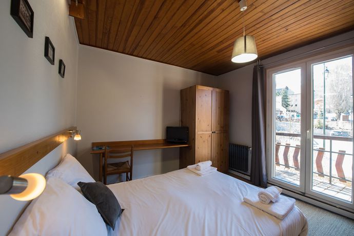 Imagen de la habitación del Hotel Hôtel Les Flocons, Le Sauze. Foto 12