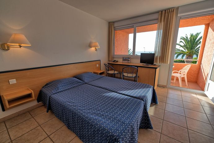 Imagen de la habitación del Hotel H&ocirc;tel Les Galets, Saint Florent. Foto 12
