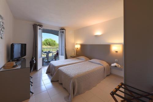Imagen de la habitación del Hotel H&ocirc;tel Les Lentisques. Foto 6