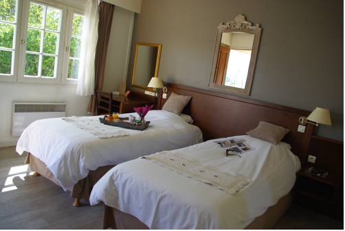 Imagen de la habitación del Hotel Hôtel Les Nymphéas. Foto 11