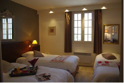 Imagen de la habitación del Hotel Hôtel Les Nymphéas. Foto 12