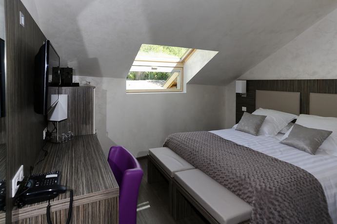 Imagen de la habitación del Hotel H&ocirc;tel Les Olivades. Foto 15