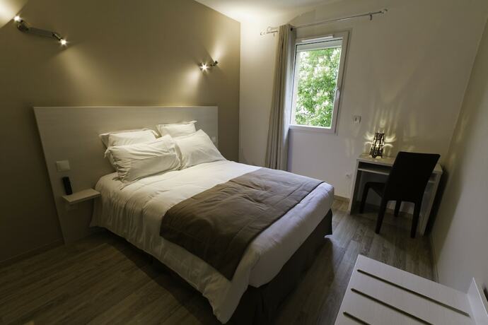 Imagen de la habitación del Hotel H&ocirc;tel Les Petits Oreillers. Foto 6