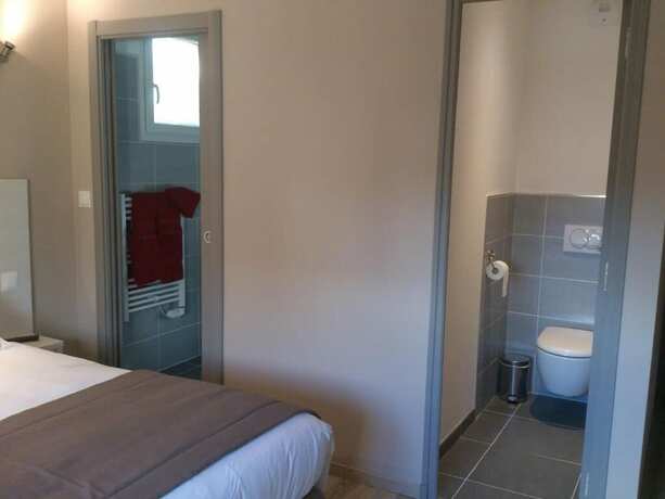 Imagen de la habitación del Hotel H&ocirc;tel Les Petits Oreillers. Foto 10
