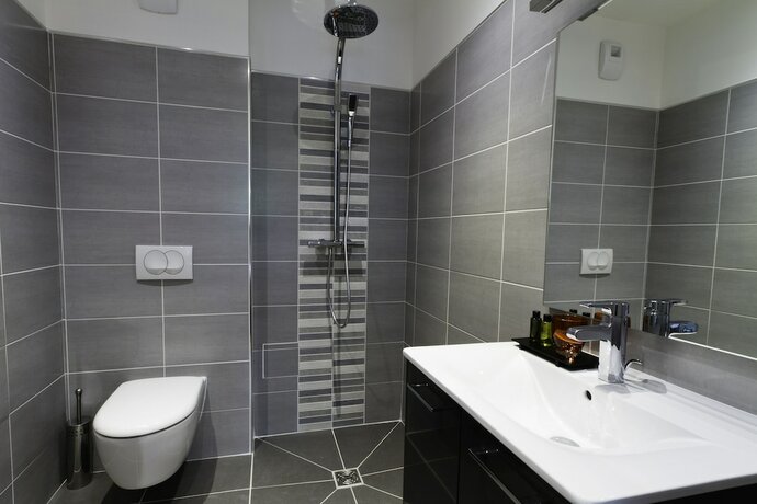 Imagen de la habitación del Hotel H&ocirc;tel Les Petits Oreillers. Foto 12
