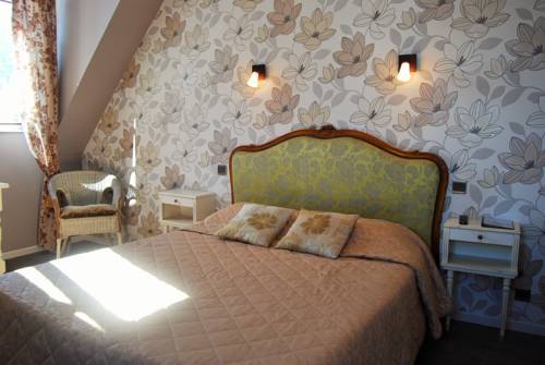 Imagen de la habitación del Hotel Hôtel Les Rochers. Foto 13