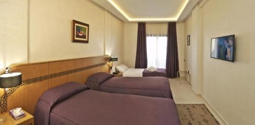 Imagen de la habitación del Hotel H&ocirc;tel L'escale. Foto 10