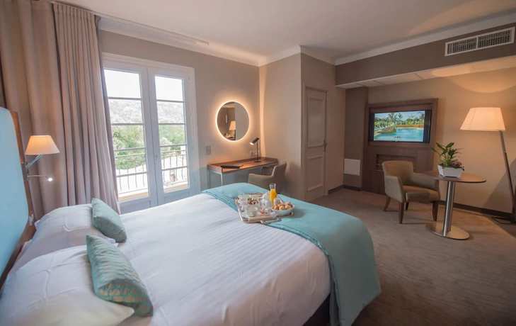 Imagen de la habitación del Hotel H&ocirc;tel Lou Castelet. Foto 10