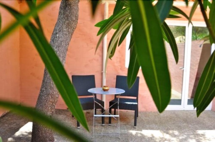 Imagen de la habitación del Hotel Hôtel Maora Village. Foto 15