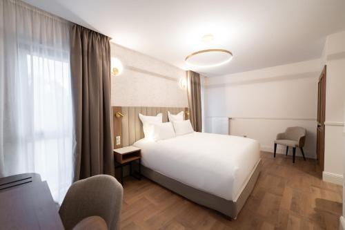 Imagen de la habitación del Hotel H&ocirc;tel Margaux. Foto 8