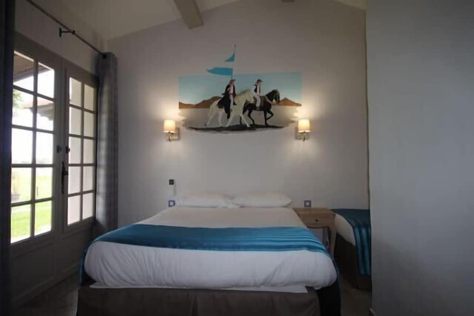 Imagen de la habitación del Hotel H&ocirc;tel Mas des Barres. Foto 10