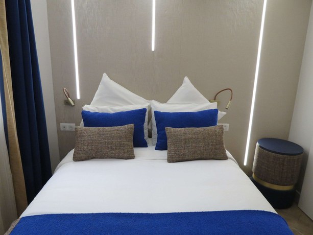 Imagen de la habitación del Hotel Hôtel Mercure Paris Opéra Lafayette. Foto 18