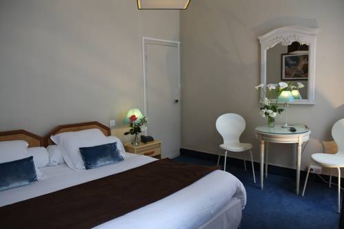 Imagen de la habitación del Hotel Hôtel Moderna. Foto 14