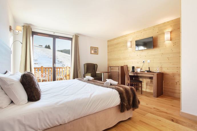 Imagen de la habitación del Hotel H&ocirc;tel Prestige Odalys Le Chamois. Foto 9